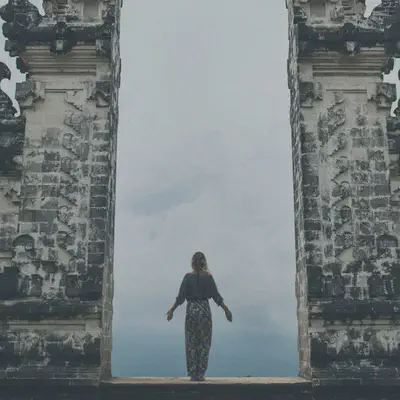 Woman Between Towers