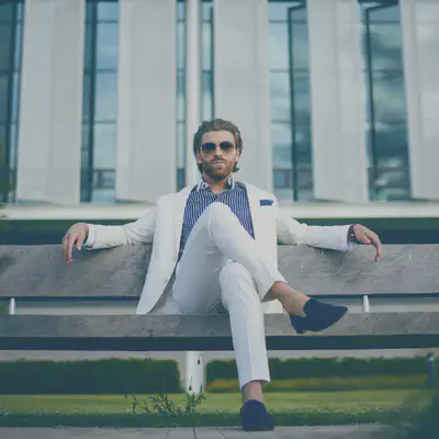 Man Sitting on Bench