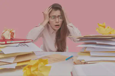 Woman In Front of Cluttered Desk